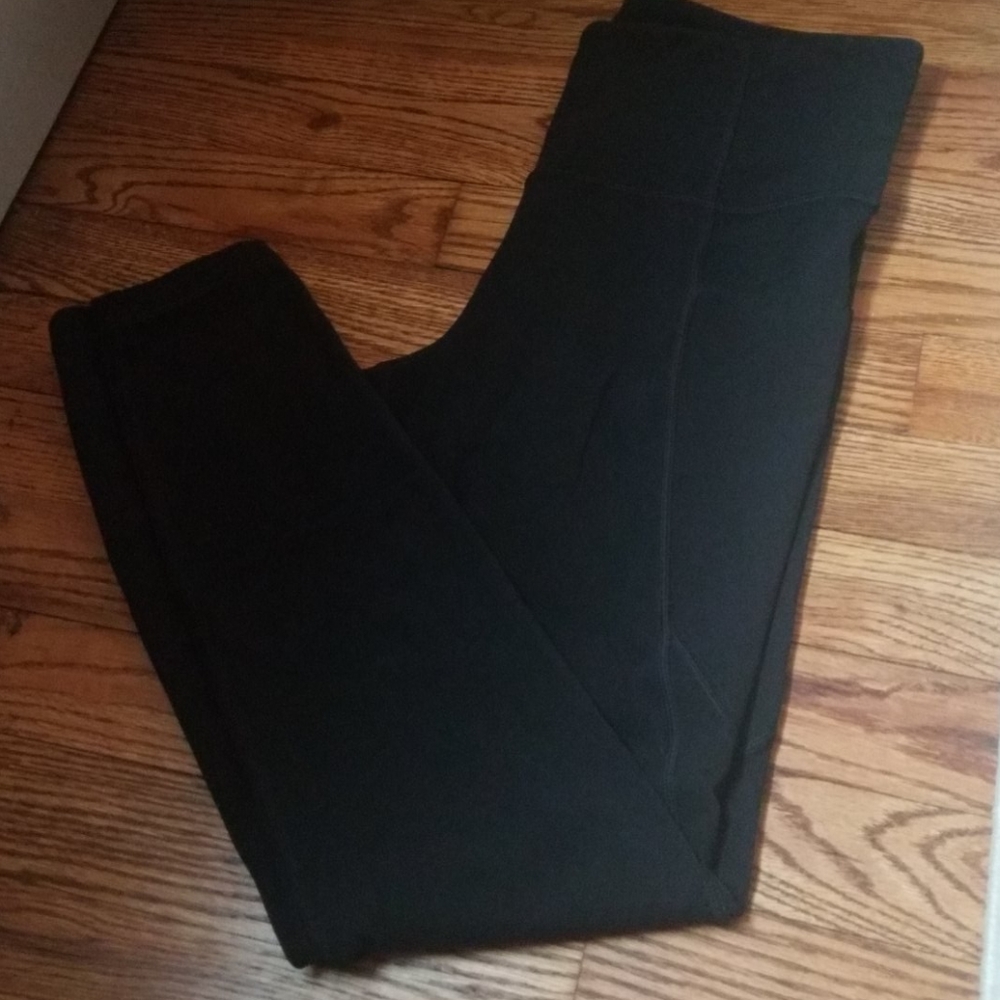 Athleta Stash Pocket Salutation Tight